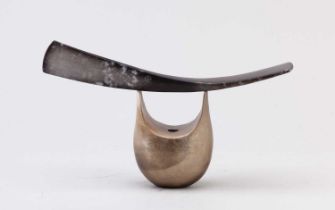 ANTONIA SALMON (born 1959); a smoke fired and burnished stoneware balancing form with curved