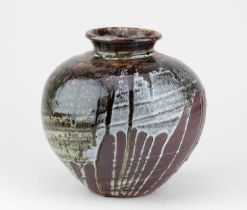 † ALEX SHIMWELL (born 1980); a globular stoneware jar partially covered in running iron and dolomite