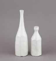 AKIKO HIRAI (born 1970); two faceted stoneware Morandi bottles covered in white glaze, incised AH