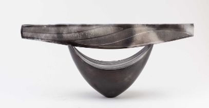 ANTONIA SALMON (born 1959); a smoke fired and burnished stoneware closed boat, incised AS marks,