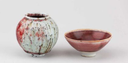 † ADAM BUICK (born 1978); a mini porcelain moon jar covered in copper red and celadon glaze,