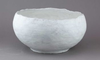 AKIKO HIRAI (born 1970); a large stoneware bowl with textured surface covered in white glaze,
