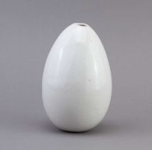 † ALAN WALLWORK (1931-2019); a porcelain egg form covered in glossy white glaze, incised W mark,