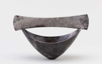 ANTONIA SALMON (born 1959); a small smoke fired and burnished stoneware open boat, incised AS marks,