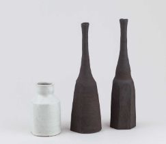 AKIKO HIRAI (born 1970); three faceted stoneware Morandi bottles, one covered in white glaze,