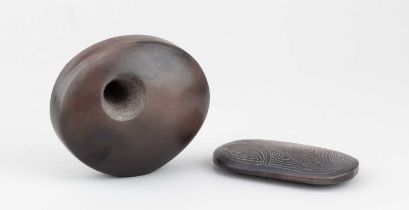 † ANTONIA SALMON (born 1959); a smoke fired and burnished stoneware pierced oval form, incised AS