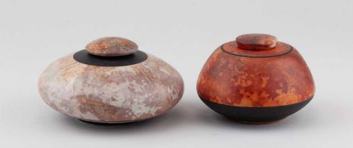 † ARDINE SPITTERS (born 1953); a squat globular smoke fired earthenware jar and cover with mottled