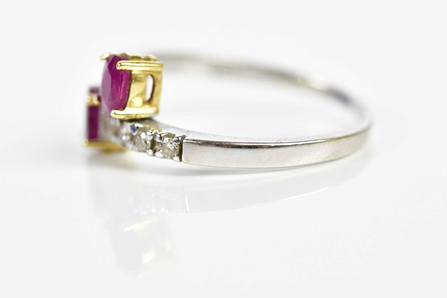 An 18ct white gold ruby and diamond crossover designed ring, size T 1/2, approx. 4.96g. - Image 2 of 3