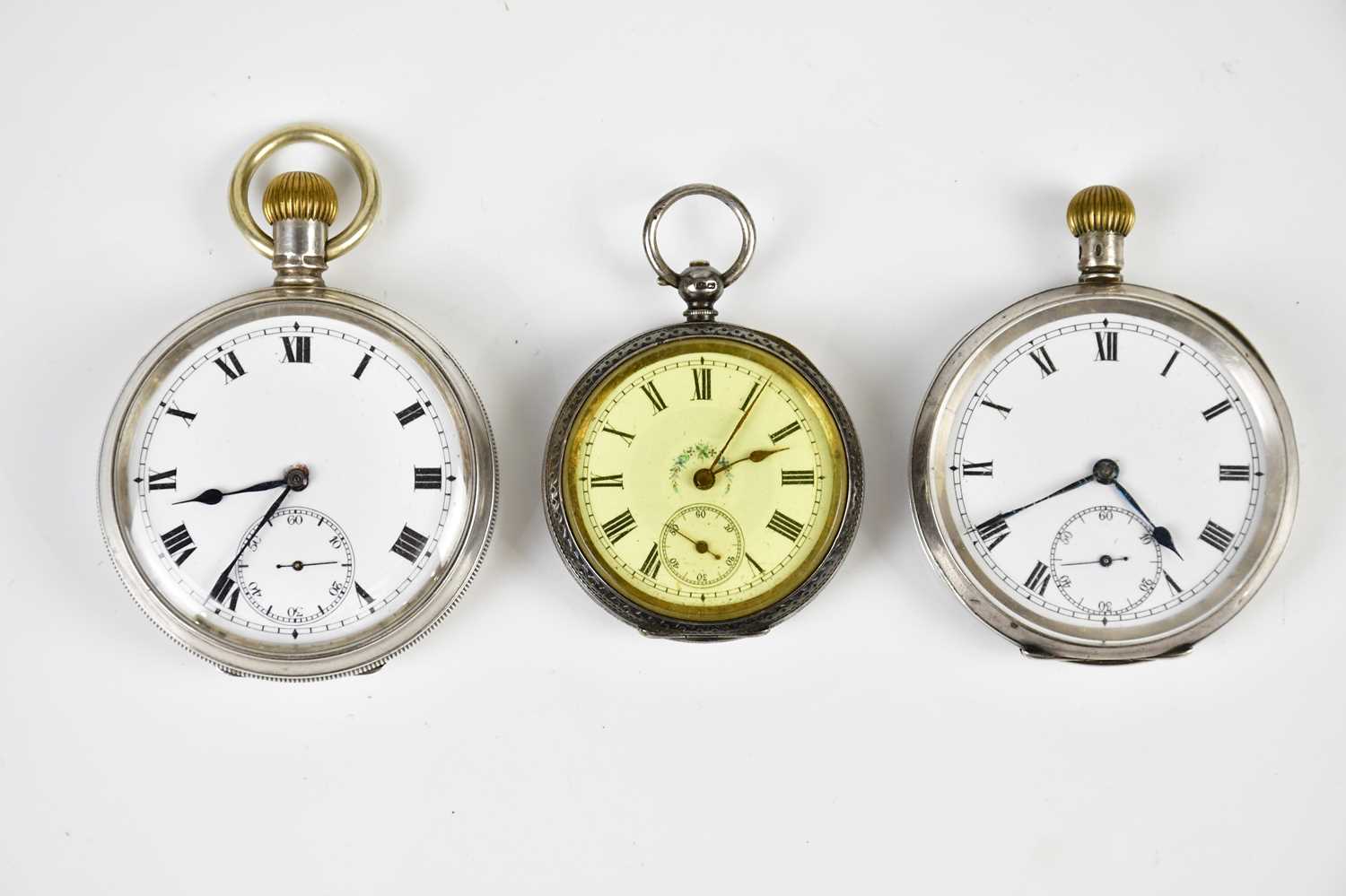 A hallmarked silver crown wind open face pocket watch, the enamel dial set with Roman numerals and