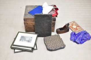 A late 19th/early 20th century pine box containing three silk handkerchiefs, a woodworking plane,