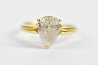 An 18ct yellow gold diamond solitaire ring, the pear shaped stone weighing approx. 2cts, with