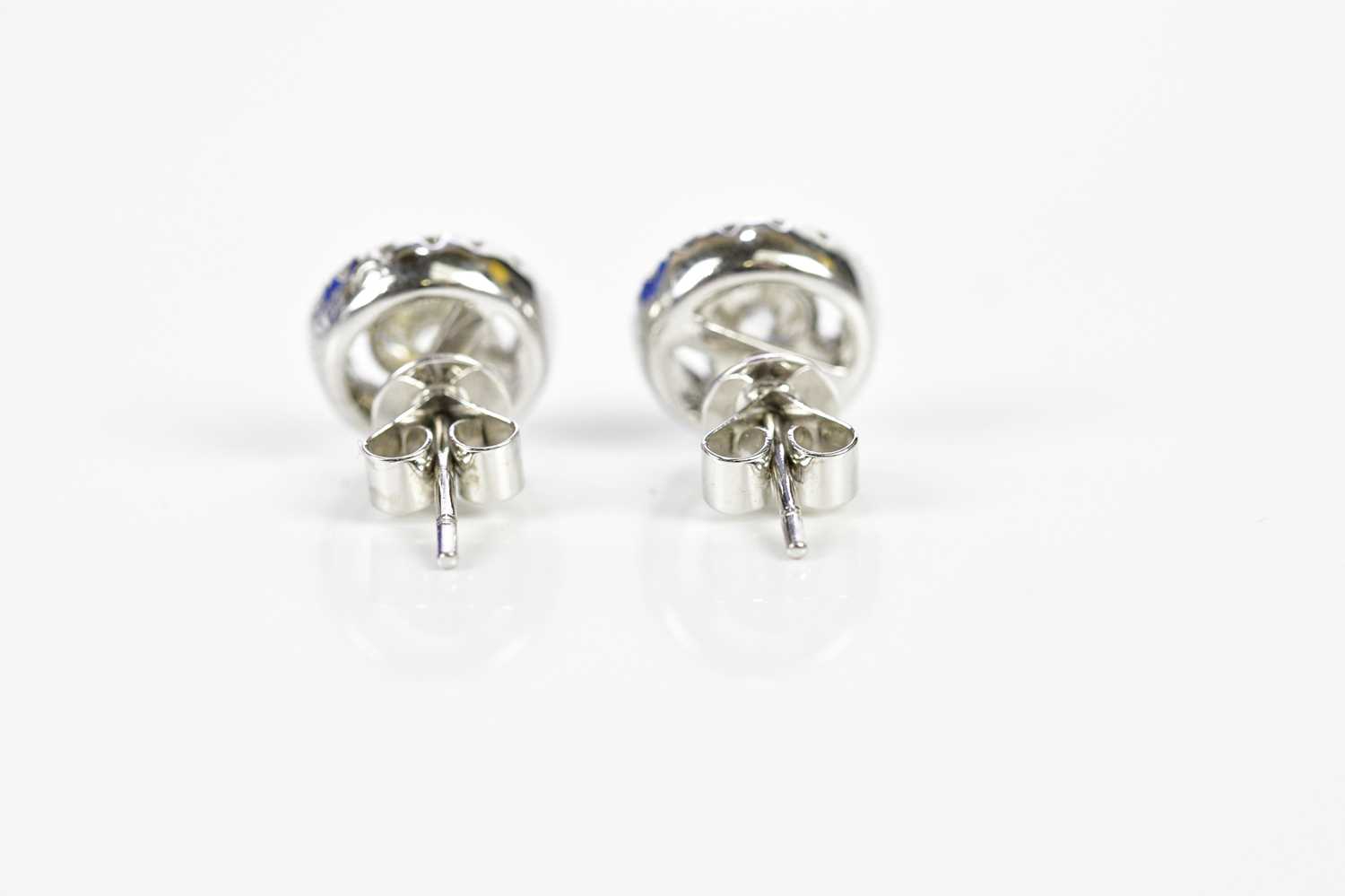 A pair of 18ct white gold and diamond halo set ear studs, each with central round brilliant cut - Image 3 of 5