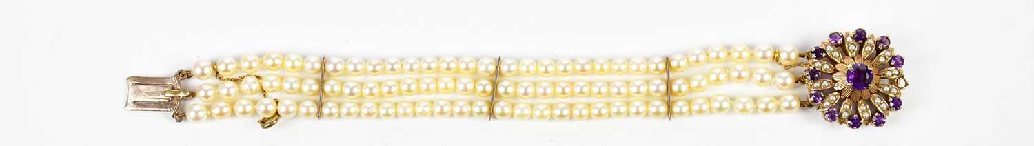 A three strand cultured pearl bracelet with large amethyst and pearl set 9ct gold clasp, length