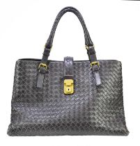 BOTTEGA VENETA; a brown Intecciato leather woven large handbag with brass tone hardware front lock