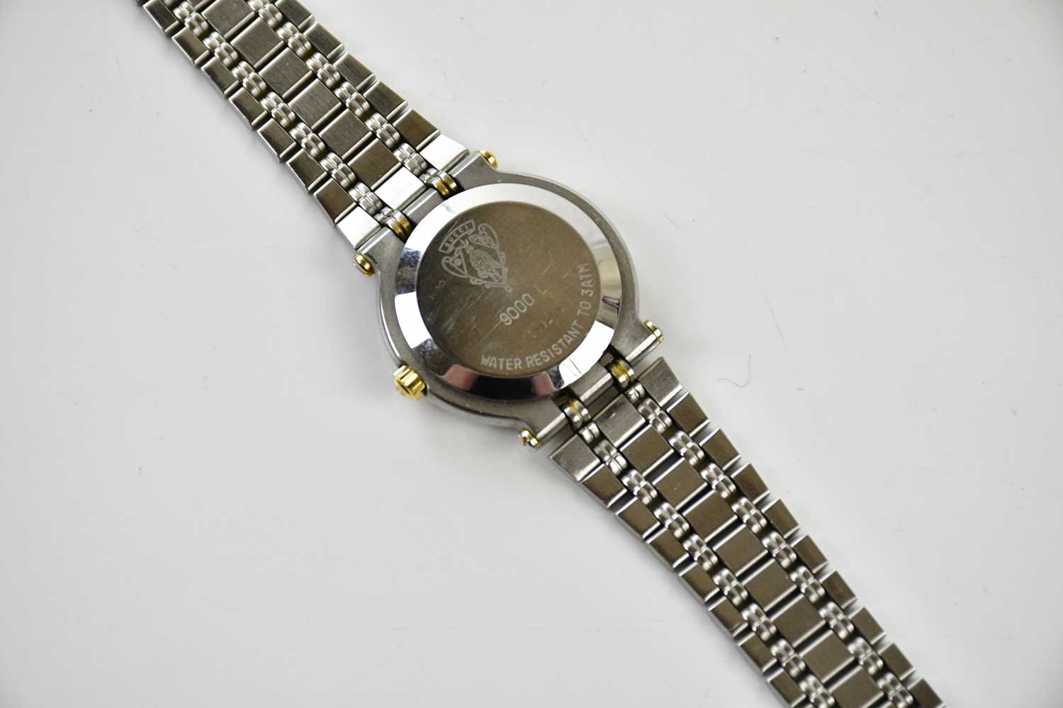 GUCCI; a vintage 9000L stainless steel and gold tone quartz wristwatch with black dial, 17cm strap - Image 3 of 3