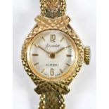 ACCURIST; a lady's vintage 9ct yellow gold wristwatch, total approx. 15.1g.