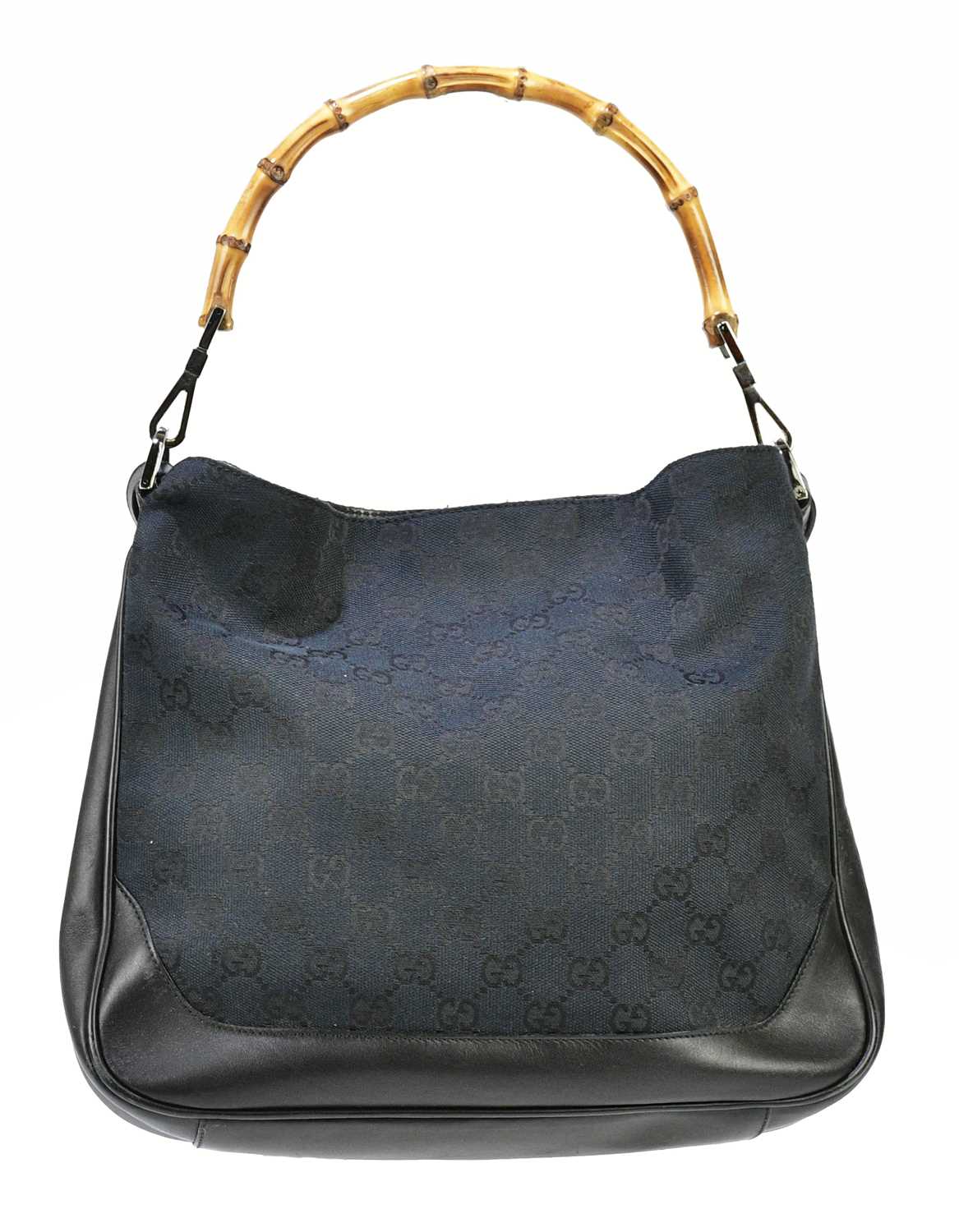 GUCCI; a black monogram canvas GG handbag with bamboo handle and black leather trim, with canvas