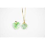 Two jade heart shaped pendants, one with 14ct yellow gold mount, also a 14ct yellow gold chain (
