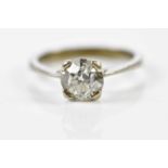 An 18ct white gold diamond ring, the corner claw set stone weighing approx. 1.25cts, size L, approx.