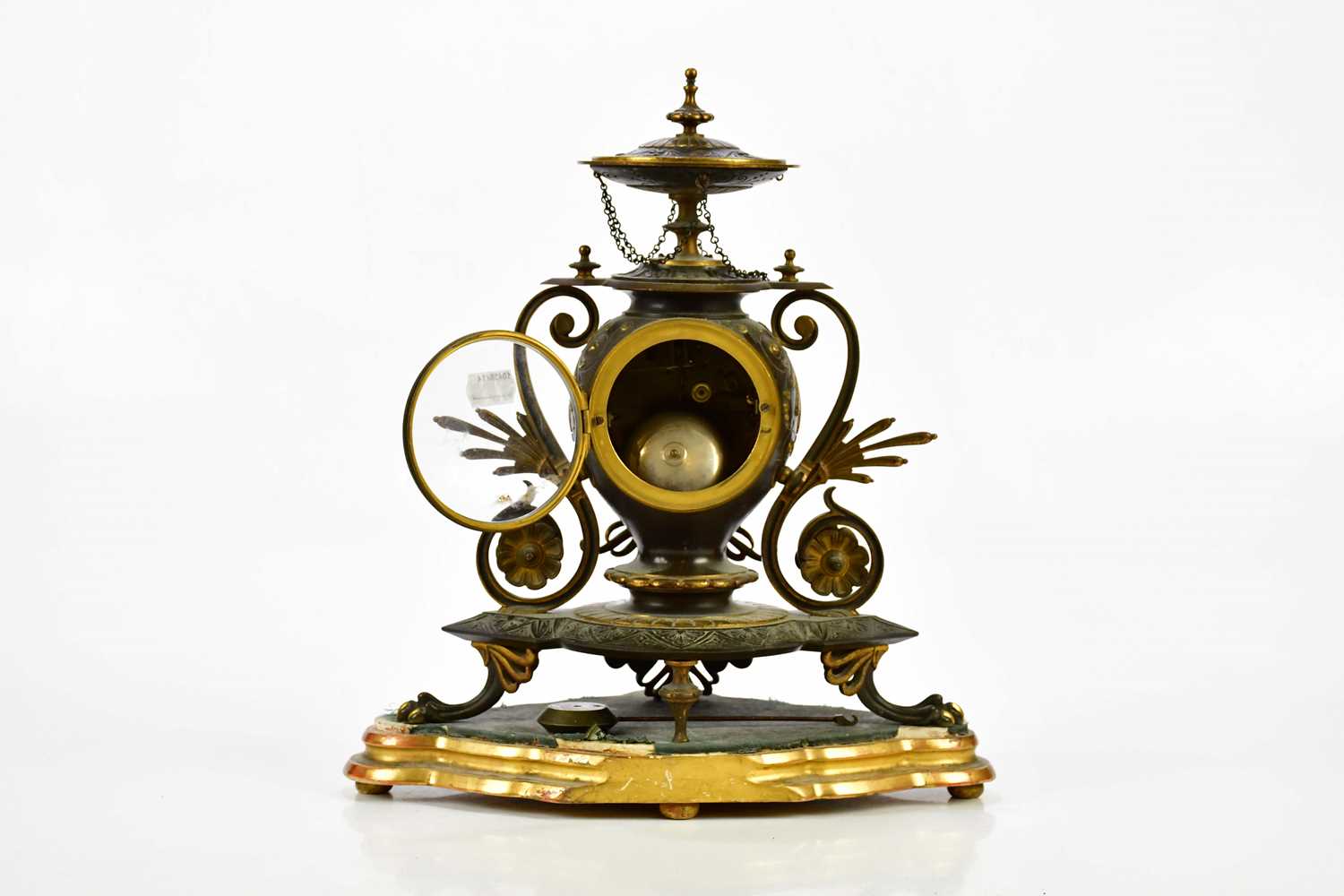 An aesthetic movement French bronze and gilt metal mantel clock with circular finial above the - Image 4 of 10