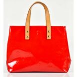 LOUIS VUITTON; a circa 2006 raspberry red Reade PM Monogram red patent Vernis leather tote bag