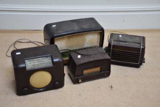 A group of four bakelite vintage radios including a Murphy, two Philips and a Bush radio.