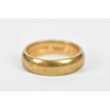 A 9ct yellow gold wedding band, size K, approx. 4.2g.