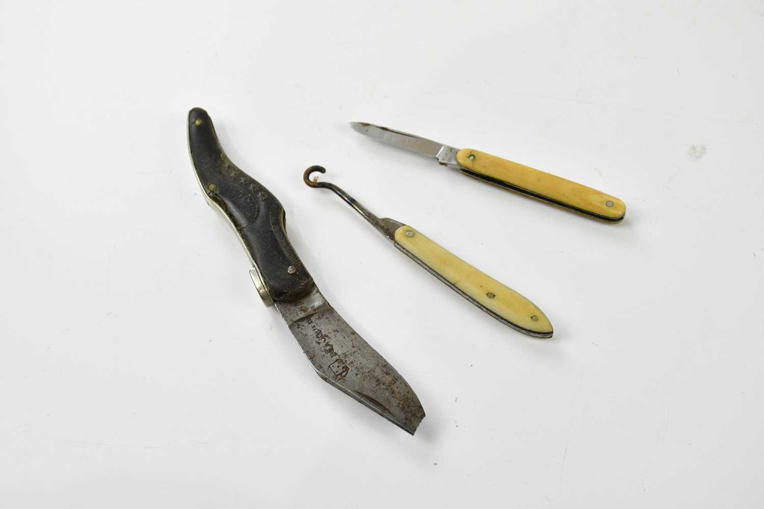 Seven fruit and miniature knives, including a mother of pearl cased example, modelled as a lady's - Image 4 of 4