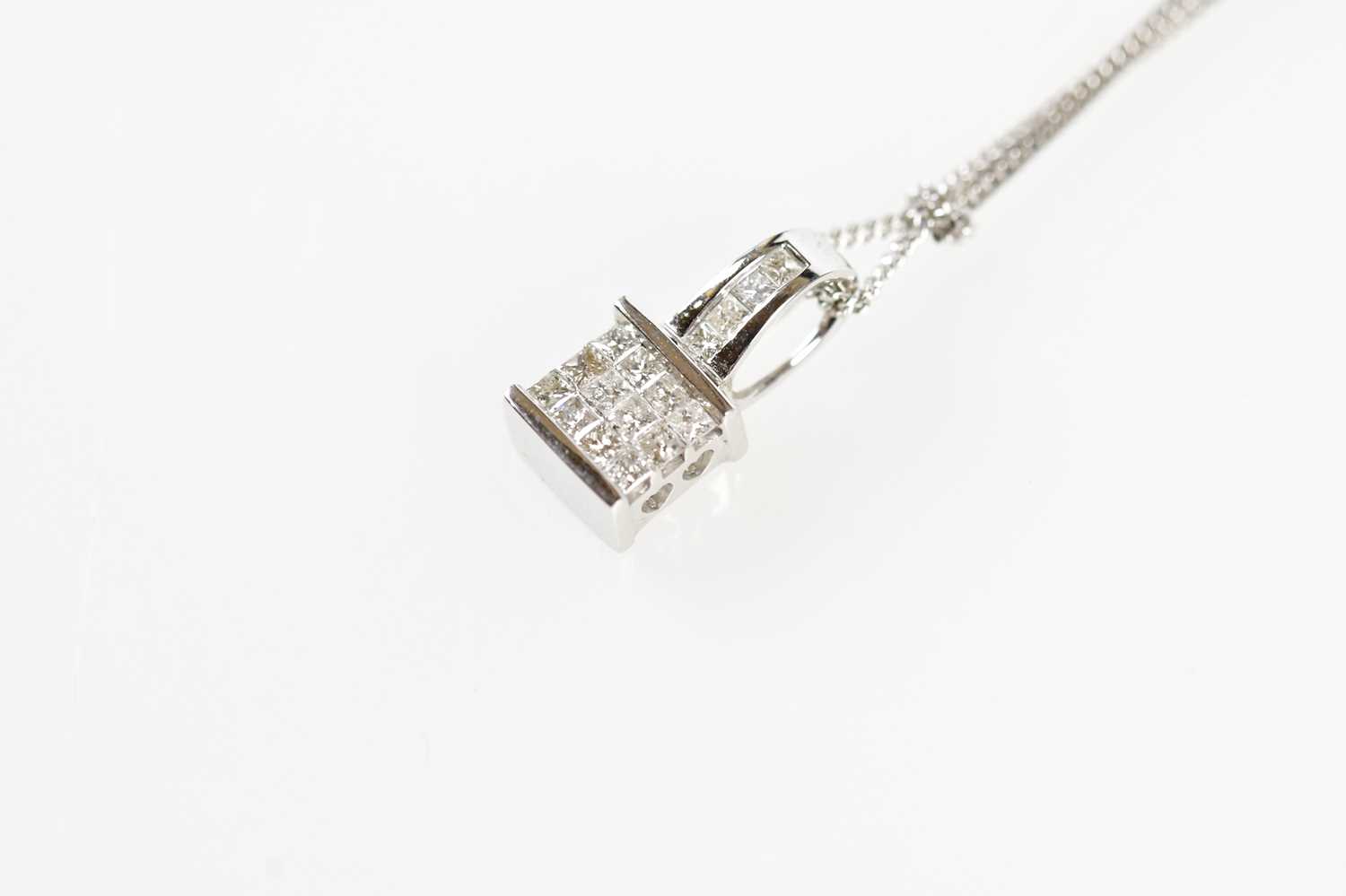 An 18ct white gold and diamond set pendant with four diamonds to the bail and twelve diamonds to the - Image 2 of 3