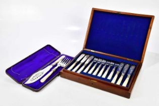 A mahogany cased twelve setting fish knives and forks with mother of pearl handles, and a cased