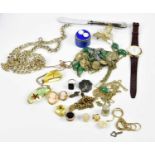 A group of costume jewellery including a hallmarked silver spoon, Thai brooch etc.