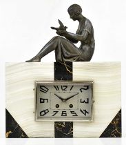 An Art Deco alabaster slate and marble figural mantel clock modelled with a spelter seated figure