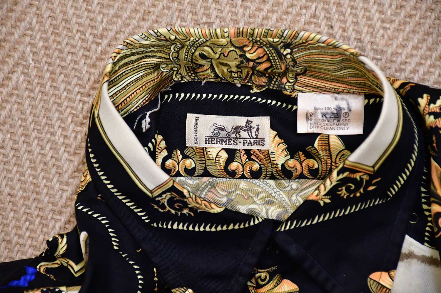 HERMÈS; a 100% silk 'Ludovicus Magnus' shirt, designed by F. De La Perriere, in mainly black, gold - Image 3 of 4