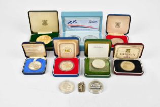 A collection of contemporary coins including Royal Airforce Fighter collection, a sterling silver