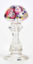 A late 19th/early 20th century glass seal with millefiori decoration, the hollow stem with