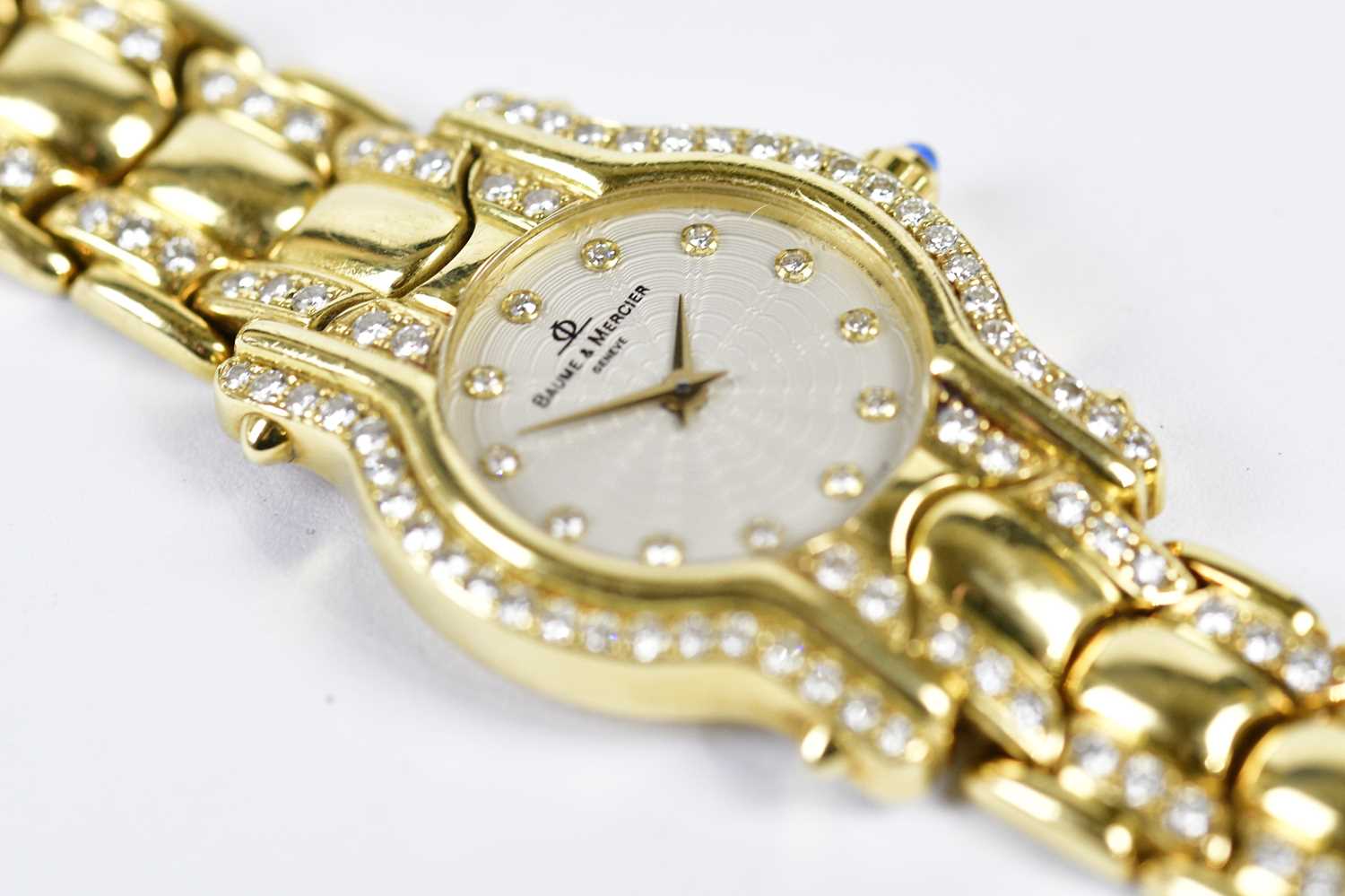 BAUME & MERCIER; a lady's 18ct gold and diamond set wristwatch, the engine turned dial set with - Image 5 of 6