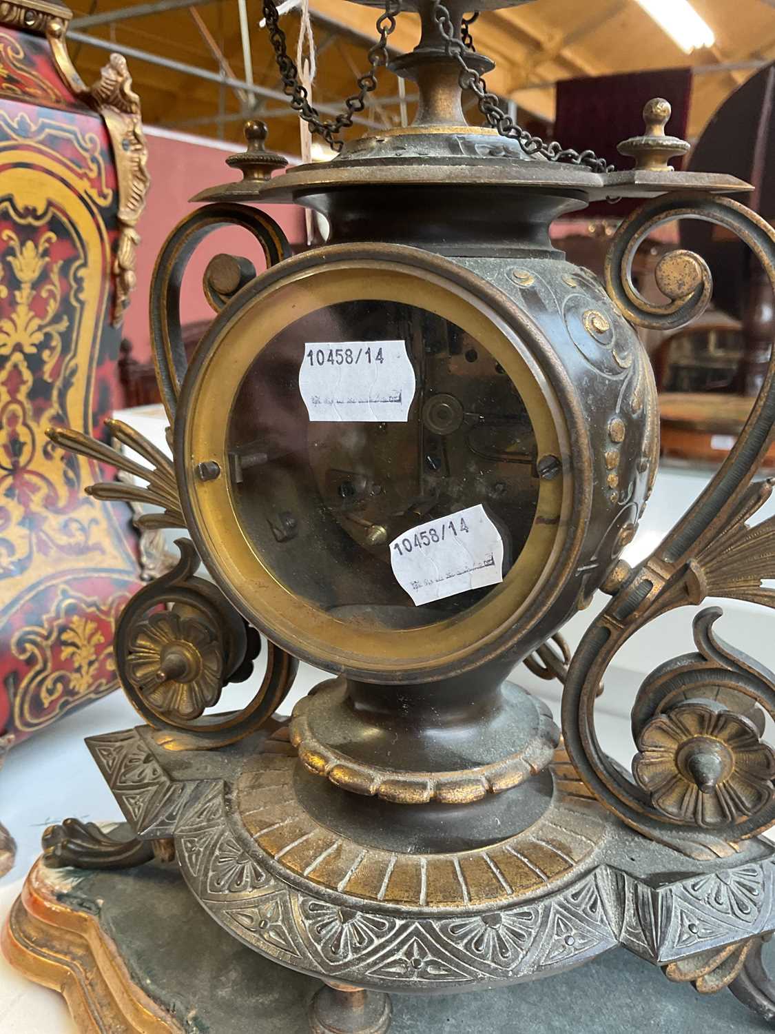 An aesthetic movement French bronze and gilt metal mantel clock with circular finial above the - Image 7 of 10