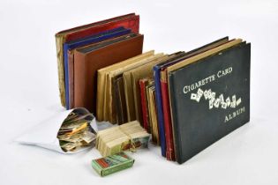 A large collection of cigarette and tea cards.