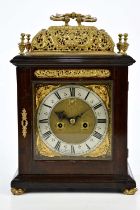 A 17th century and later bracket clock, the pierced brass canopy above square dial set with silvered