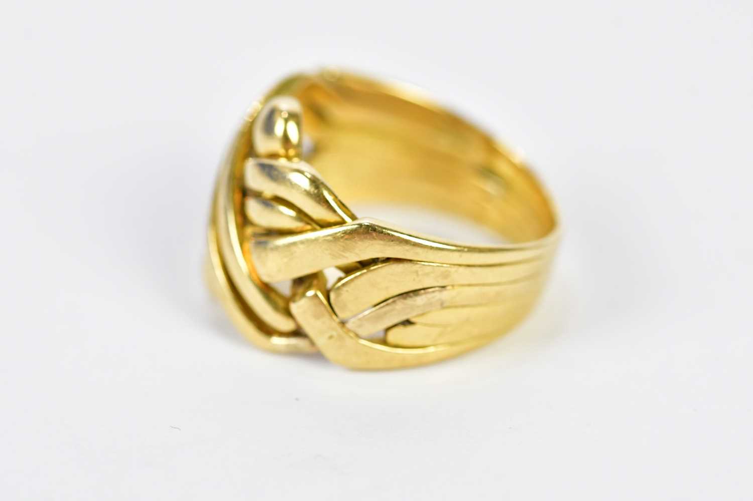 An 18ct yellow gold puzzle ring, size O, approx. 9.75g. - Image 2 of 3