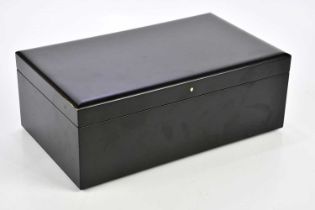 A contemporary black lacquered humidor, width 36cm, depth 20cm.