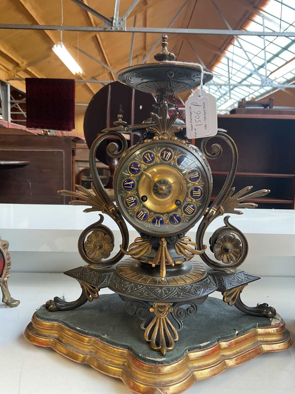 An aesthetic movement French bronze and gilt metal mantel clock with circular finial above the - Image 5 of 10