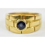 CARTIER; an 18ct yellow gold and sapphire single stone ring, signed, indistinct number 771, size '