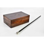 A 19th century mahogany writing slope, together with an ebonised cane with hallmarked silver top.