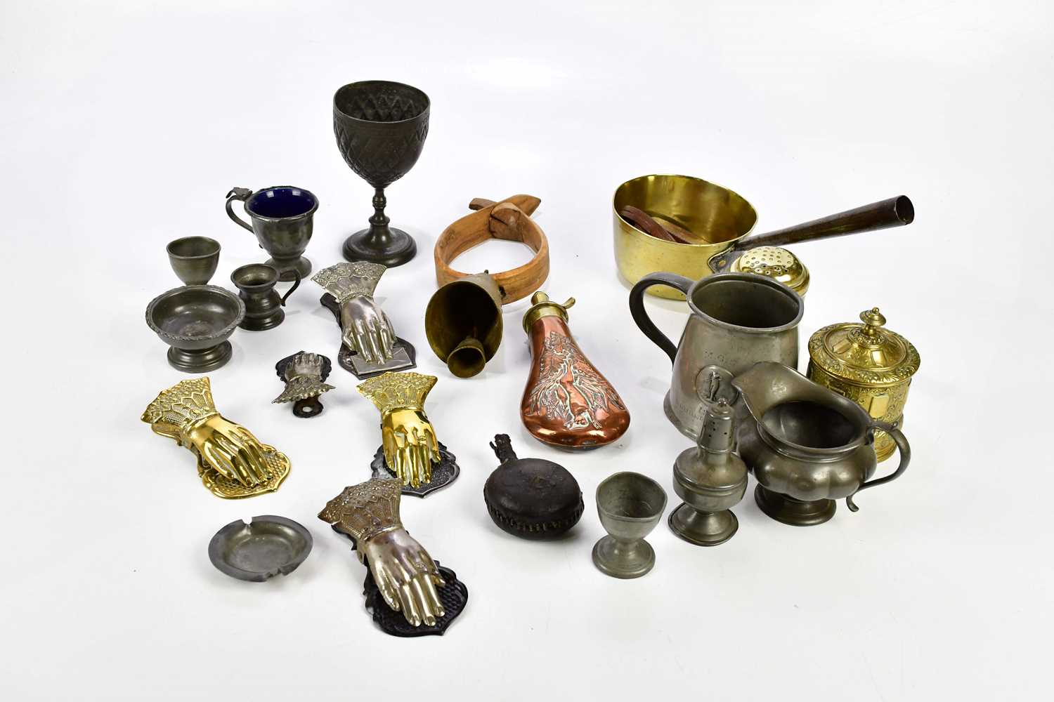 A collection of 19th century and later metalware, including Victorian paperclips, Georgian brass