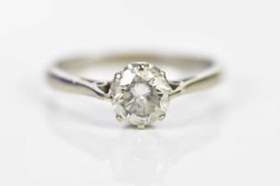 An 18ct white gold and diamond solitaire ring, the round brilliant cut stone weighing approx. 1ct,