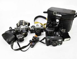 A collection of cameras including a Pentax Zoom 90WR, a Praktica MTL 5B etc, together with a pair of