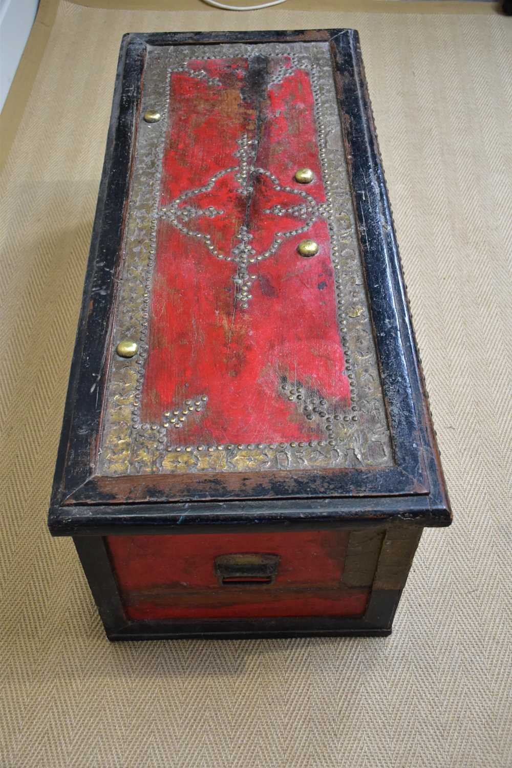 An early 20th century Zanzibar chest with applied studded decoration and hinged top above three - Image 4 of 6