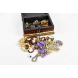 A small quantity of costume jewellery to include faux pearls, vintage brooches, rings, and glass