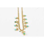 An 18ct and 15ct yellow gold necklace, the lower section set with seed pearls and turquoise in a